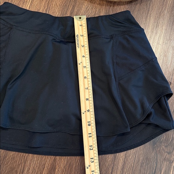 Athleta tennis skirt size XS. Built in mesh shorts, non-slip hem, ball pockets - Picture 12 of 14